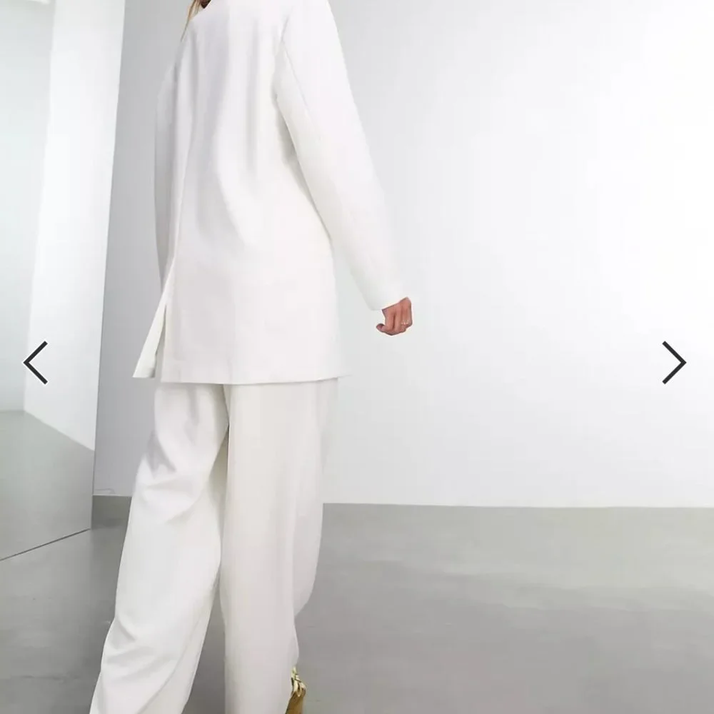ASOS EDITION pleat front wide leg wedding pant in ivory - Picture 2 of 8